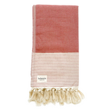 Red and white striped artisan towel with tassel fringe.