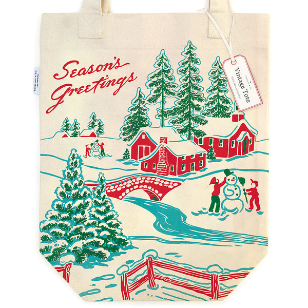 vintage tote from Cavallini & Co with seasons's greetings text and winter scenery graphic