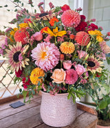 Joyful Regal Floral Arrangement with dahlias, sunflowers, roses, marigold, rudbeckia, and more.