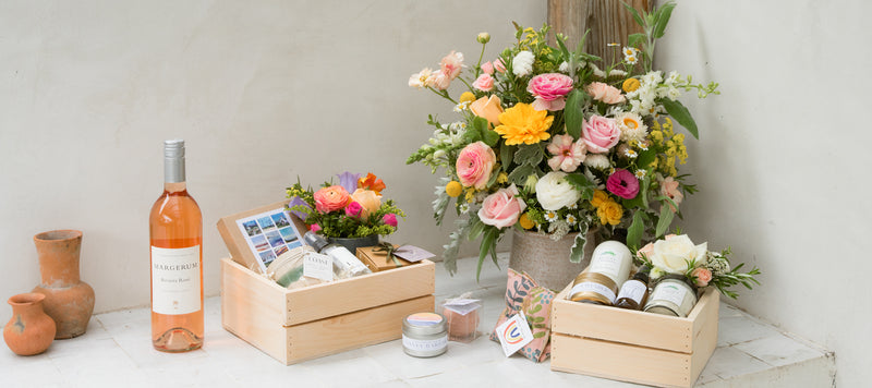 product array with flowers, gift baskets and wine gifts.