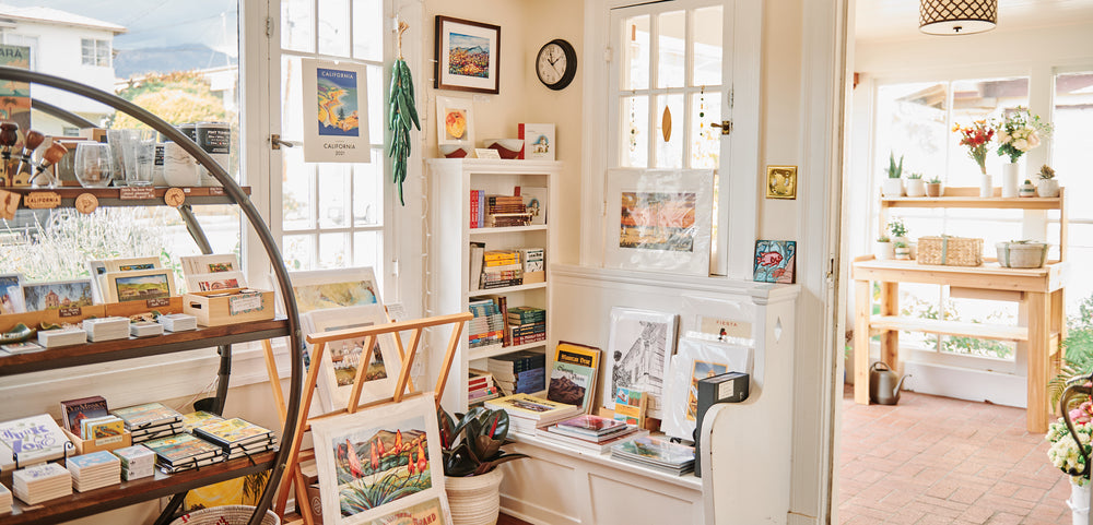 santa barbaea company gift shop shelves with local books, gifts, art and more